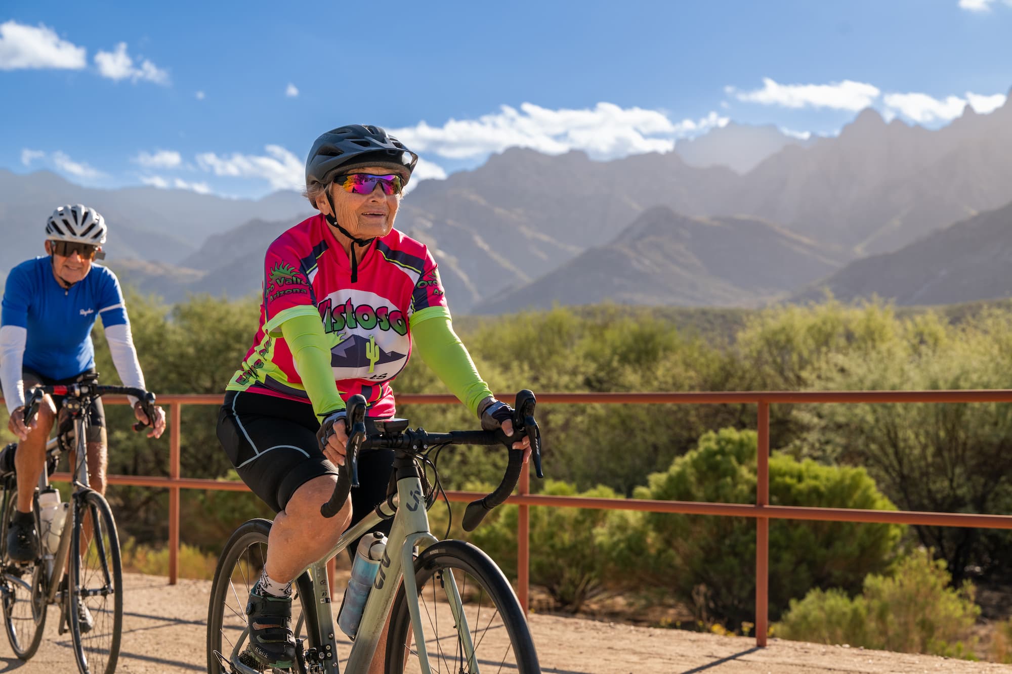 senior couple riding bikes around La Posada