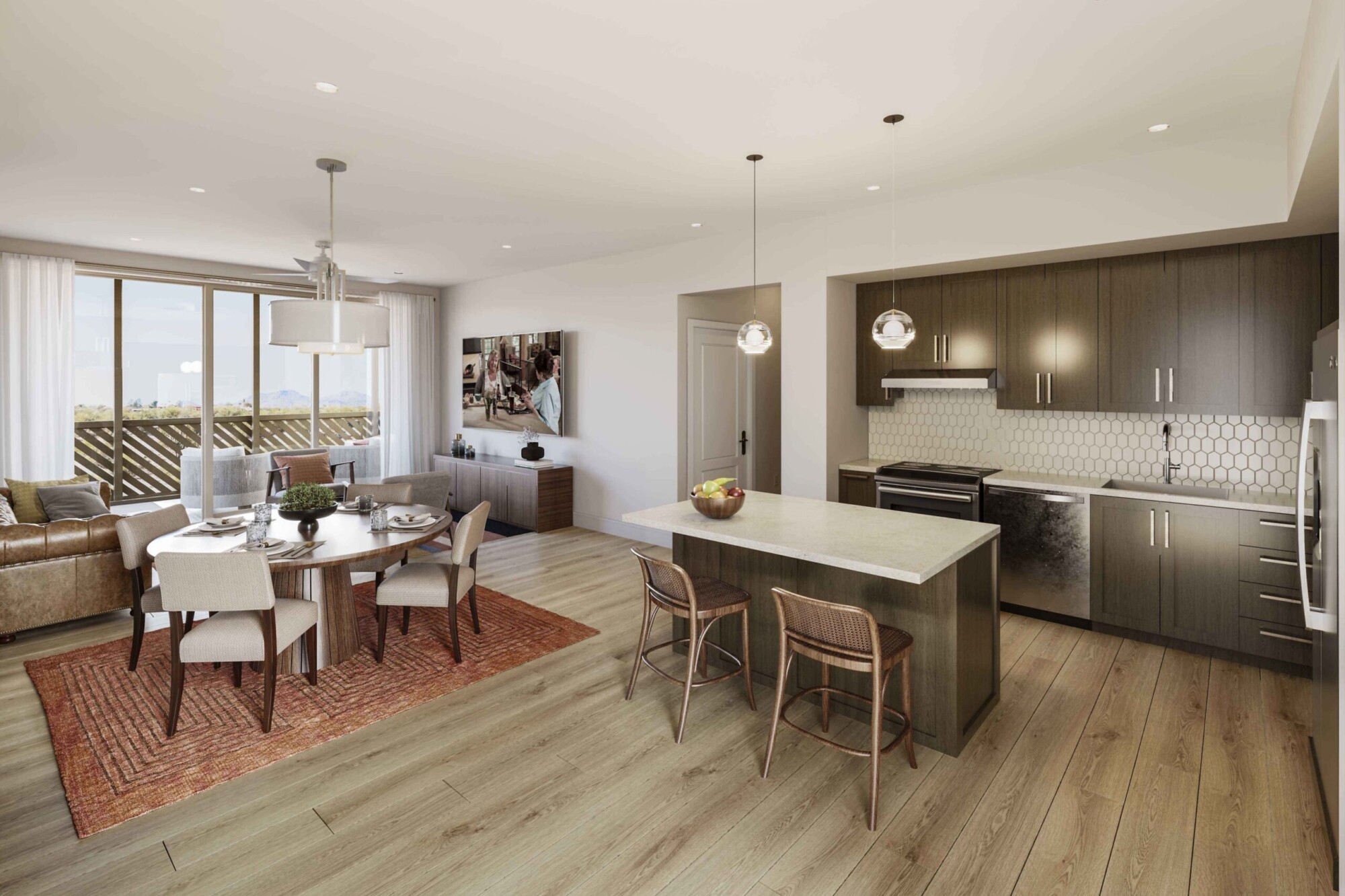 Larkspur apartment interior featuring an open kitchen and dining area with wood-look flooring. The kitchen includes dark cabinetry, stainless steel appliances, a tile backsplash and large island with seating, while the adjacent dining room and living area open through sliding glass doors to a furnished balcony.